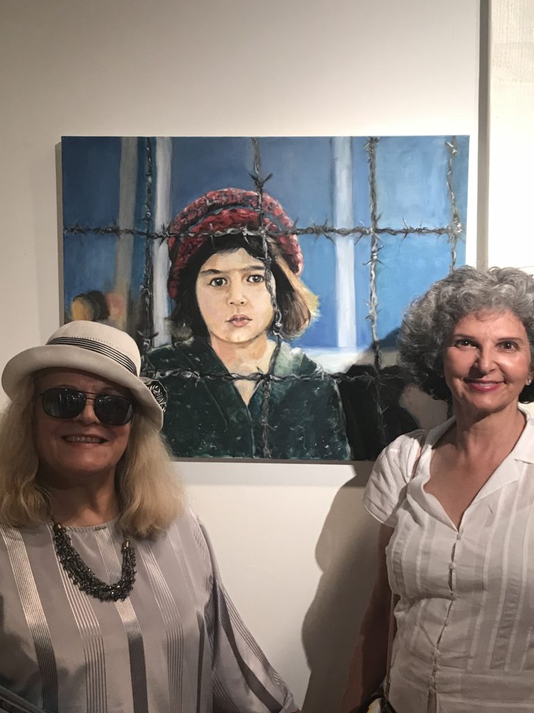Student at art gallery show